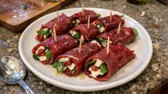 Rouleaux de bresaola au Boursin, roquette et parmesan : l’apéritif chic sans cuisson